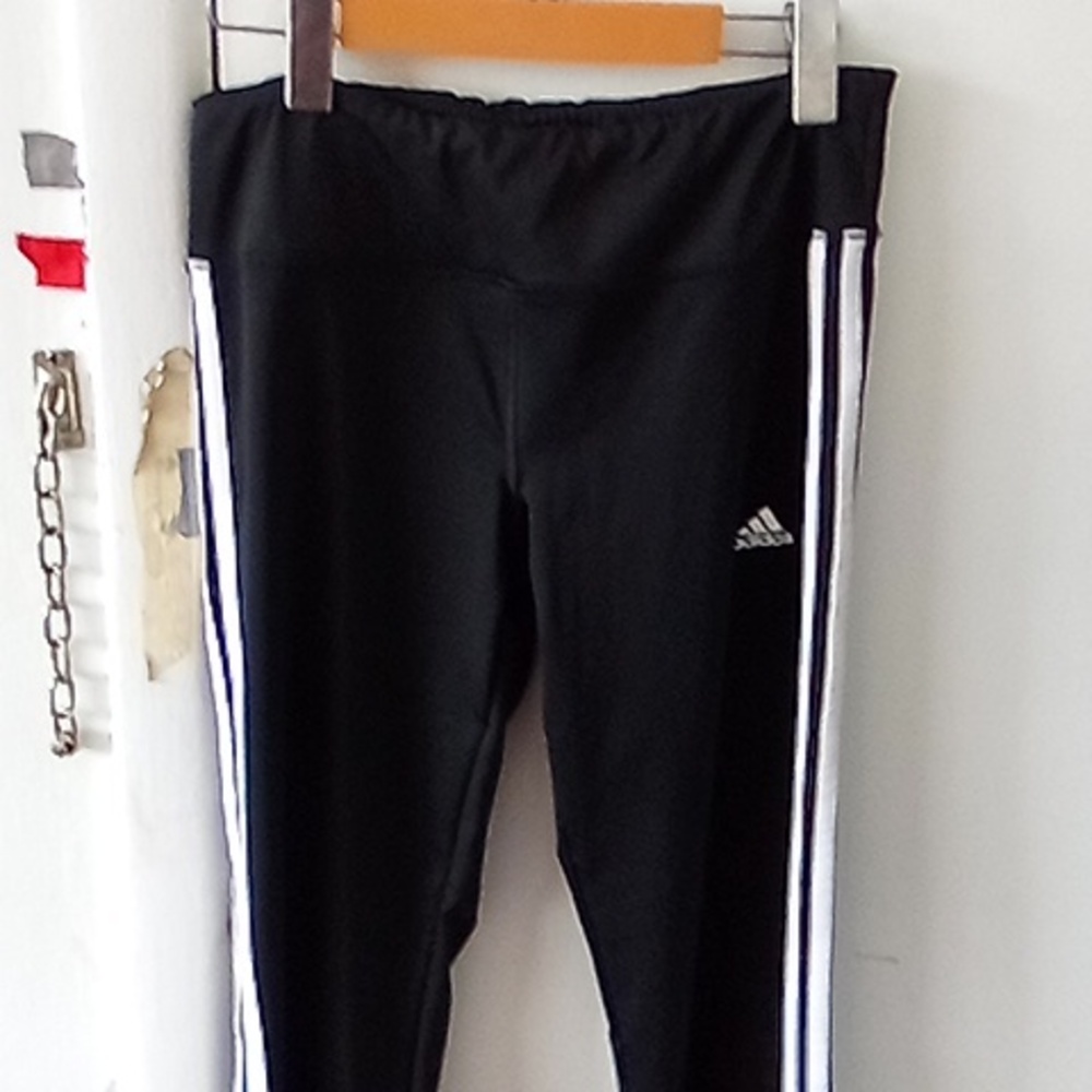 Women's Adidas tight spandex pants size small and color black and white